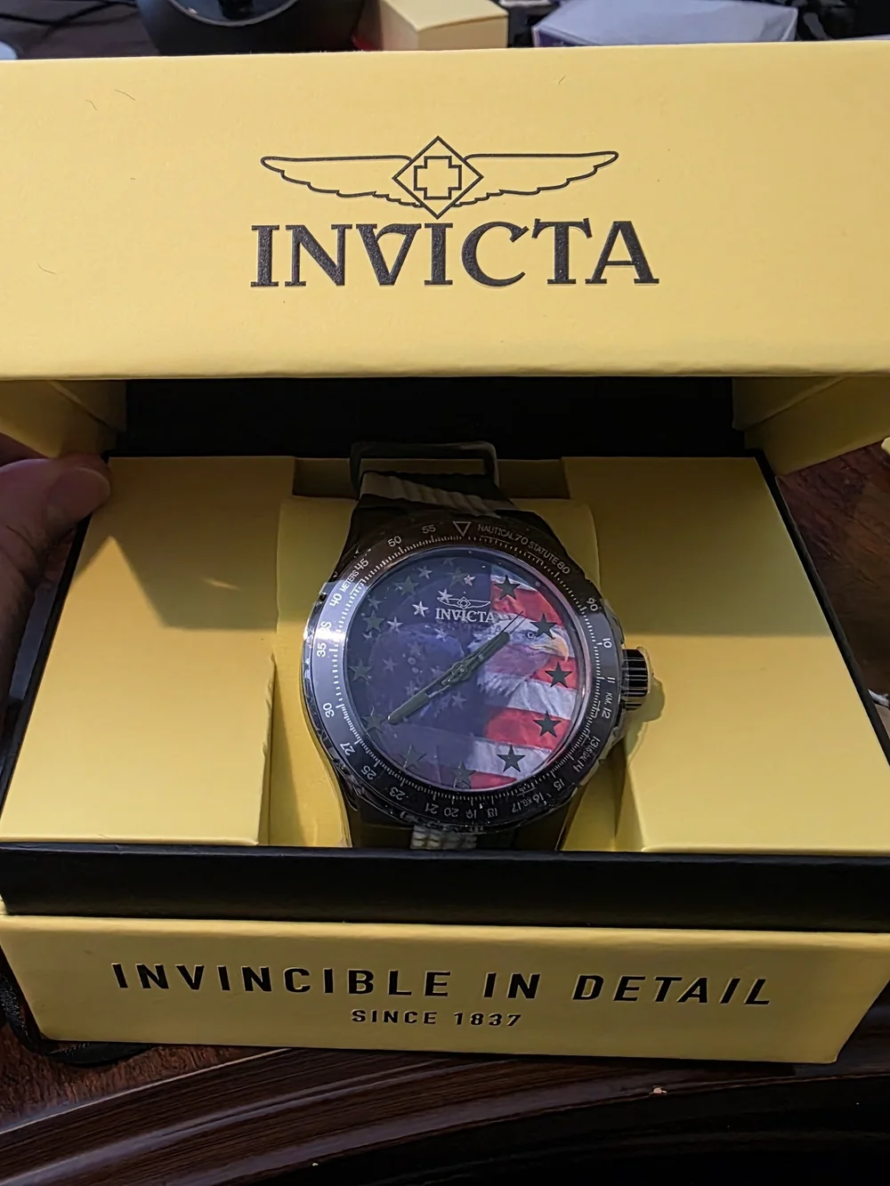 Invicta wristwatch featuring